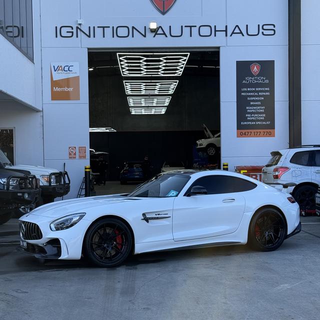 Mercedes-AMG GT at the workshop roller door