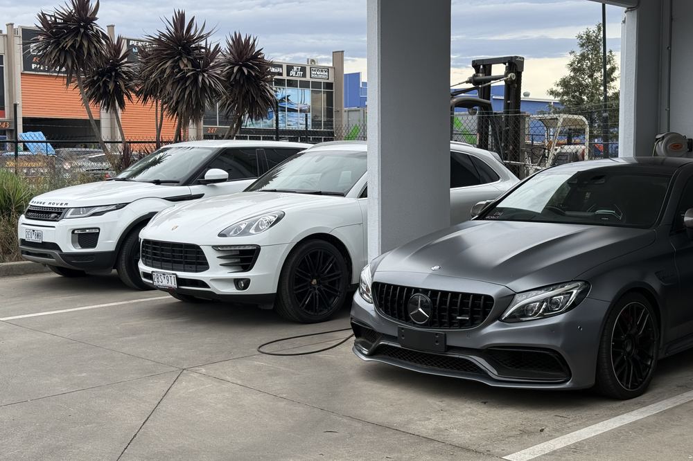 Customer cars parked out the front of the Derrimut workshop